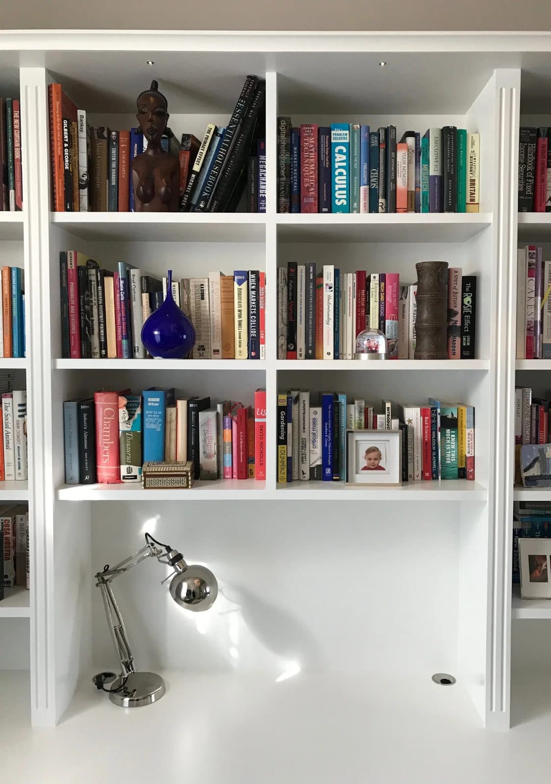 22mm shelves with a solid lipping; no sag under hardbacks.