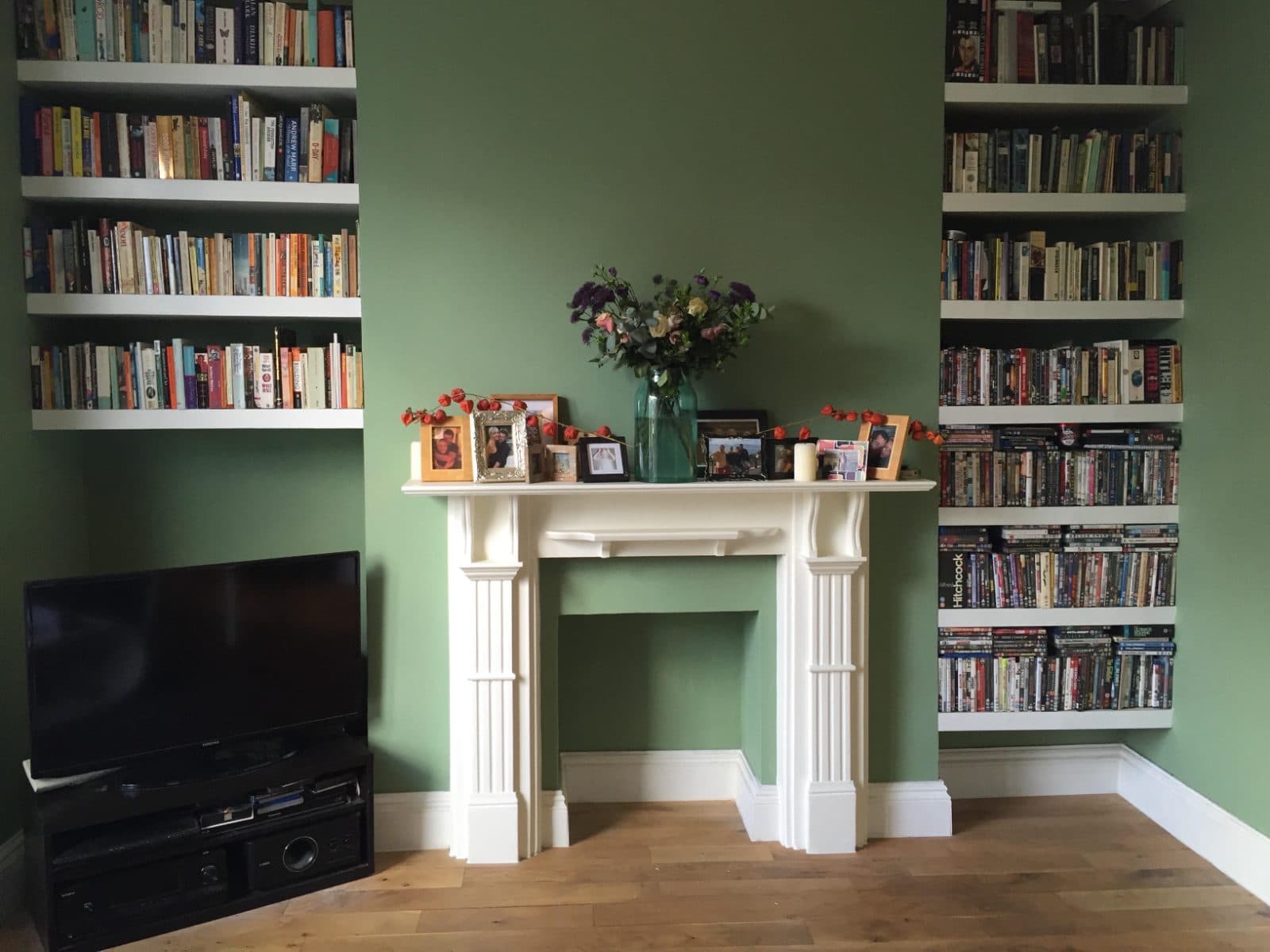 After: Two alcoves, one wall of books